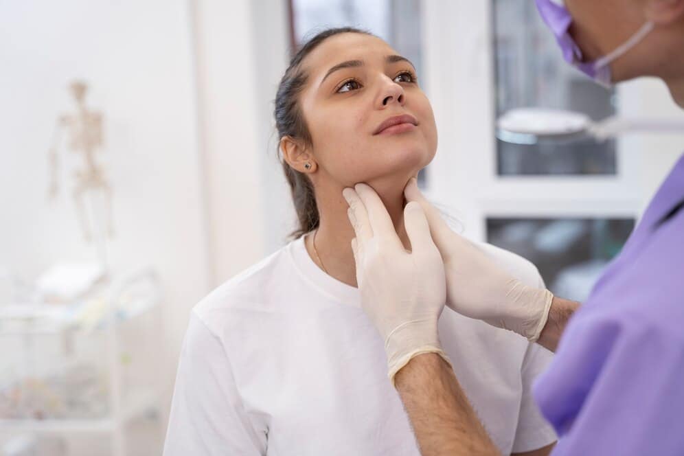 doctor performing routine medical checkup 23 2149281110